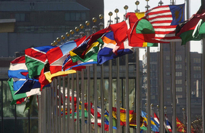 Flags of member nations flying at the United Nations headquarters.