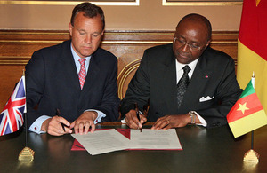 Foreign Office Minister Mark Simmonds with Pierre Moukoko Mbonjo, Cameroon Minister for External Relations in London.