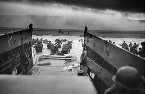 US troops wade ashore on Omaha Beach on the morning of 6 June 1944.