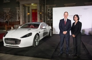 Ambassador Sebastian Wood and Jenny Zheng, Regional Director of Aston Martin China next to Aston Martin Centenary Edition model in Residence grounds