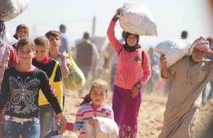 Syrian Kurdish refugees cross into Turkey, September 2014. According to UN figures, there are more than 2 million Syrian refugees registered in Turkey. Picture: EC/ECHO
