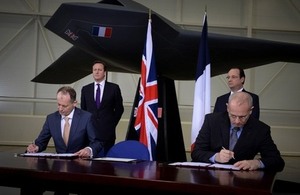 Dr David Parker, CEO of UK Space Agency and Jean-Yves Le Gall, President of CNES sign agreement on closer relationship on space projects overseen by Prime Minister David Cameron and French Presendent Hollande.