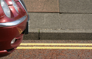 car on yellow lines