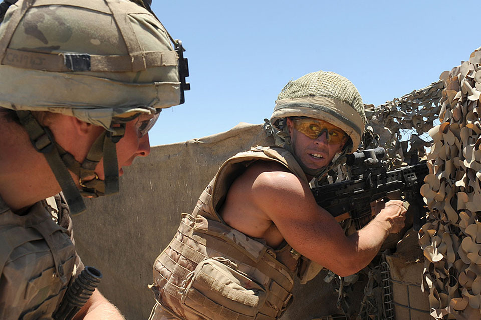 Policeman on patrol in Sangin