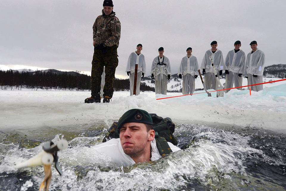 Royal Marines conducting ice-breaking drills [Picture: Petty Officer (Photographer) Sean Clee]