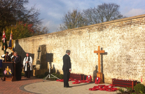 Defence Secretary Michael Fallon pays his respects in Aylesford on Armistice Day [Picture: Crown copyright]