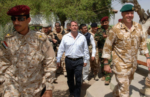 Dr Liam Fox visiting British and Iraqi troops in Basra, Iraq, in September 2008