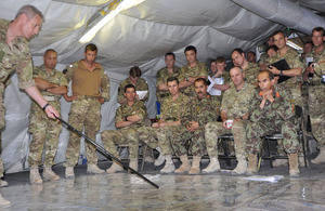 British and Afghan military personnel during the planning stages of Operation OMID HAFT