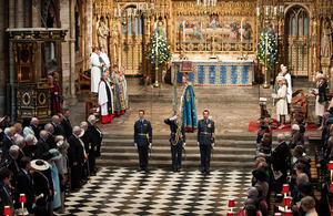 Flight Lieutenant Alister Barker (centre) carries the standard of 32 (The Royal) Squadron at Westminster Abbey, escorted by Flight Lieutenants Jonathan Humphreys and Ian Davies