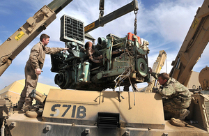 Vehicle mechanics changing a power plant on a Challenger armoured repair and recovery vehicle (library image) [Picture: Corporal Wes Calder RLC, Crown copyright]