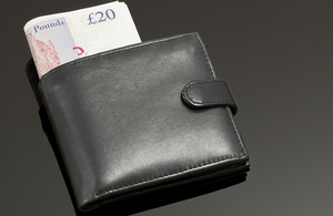 Wallet showing £20 banknotes