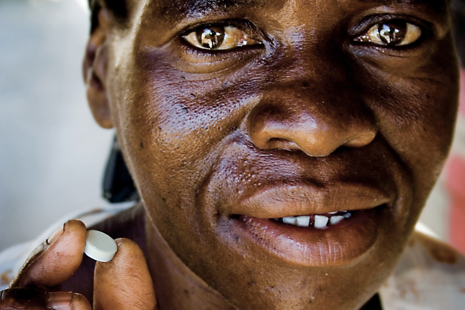 Claris Chauruka, HIV positive, holding an ARV pill that forms part of her combination therapy. Picture: The Elizabeth Glaser Pediatric AIDS Foundation