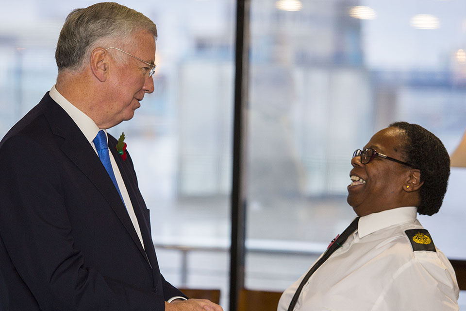 Sir Michael Fallon congratulated Chief Petty Officer Evadne Gordon for becoming the longest serving female member of the Royal Naval Reserves.