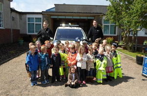CNC visit to Pennyland Primary School. Pictured in front of a police vehicle.