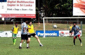 British Deputy High Commissioner Ms. Laura Davies playing football