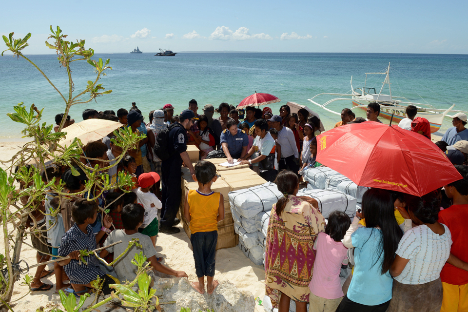 Handing over stores to a community on the island of Guintacan 