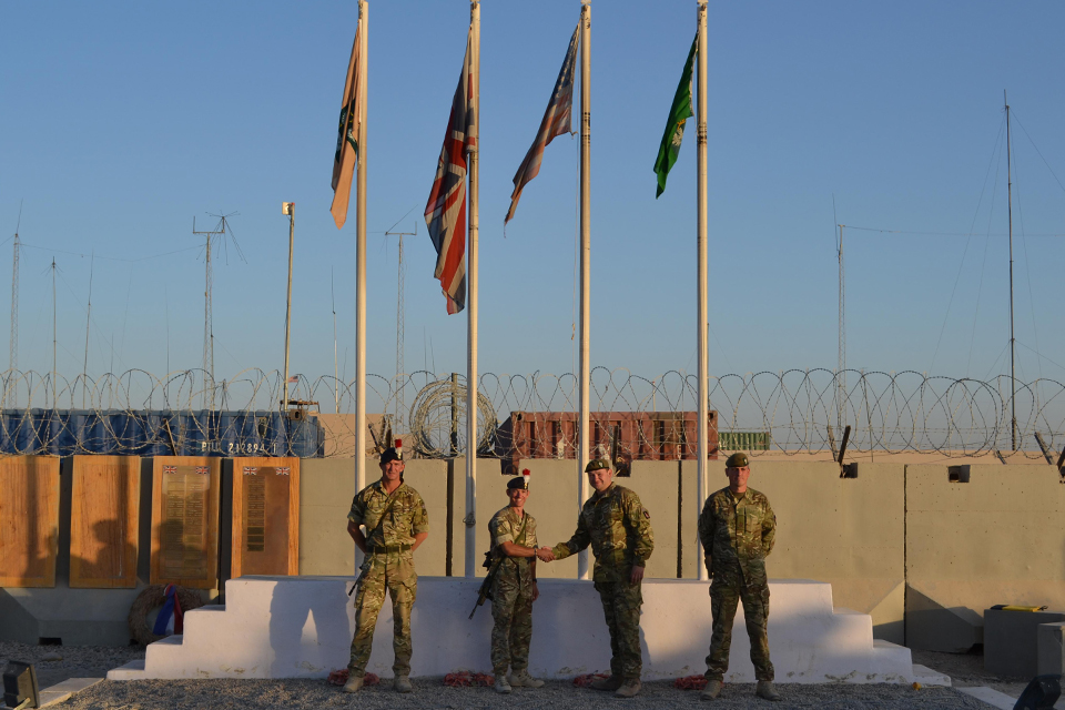 Flag changing ceremony at Main Operating Base Price