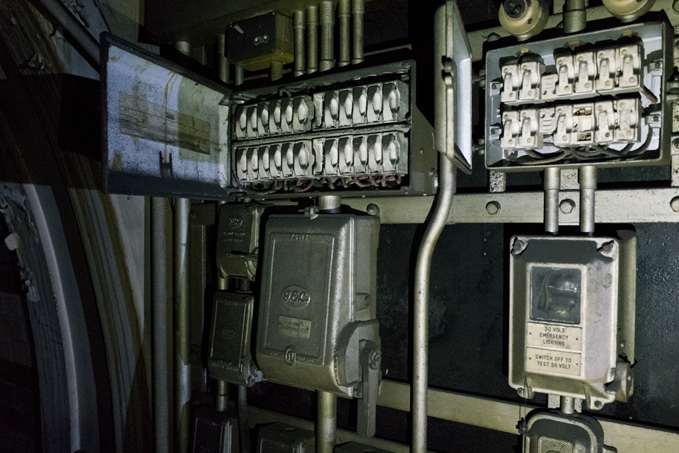 Old electrical switches inside the disused tube station