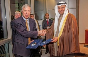 Earl Howe and His Excellency Dr Ali Saad Al-Obaidi, Minister of Health for Kuwait, sign the Memorandum of Understanding at Arab Health in Dubai