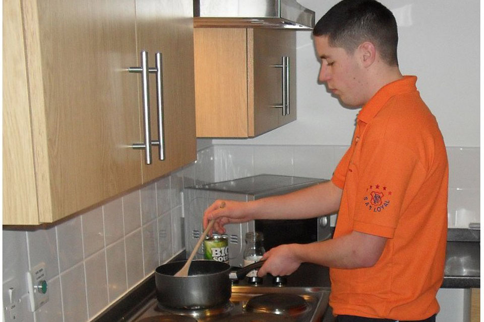 Cooking for one; a soldier uses the new facilities at Marne Barracks 