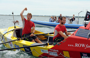 Captains Hamish Reid and Nick Dennison cross the finish line in the Solent