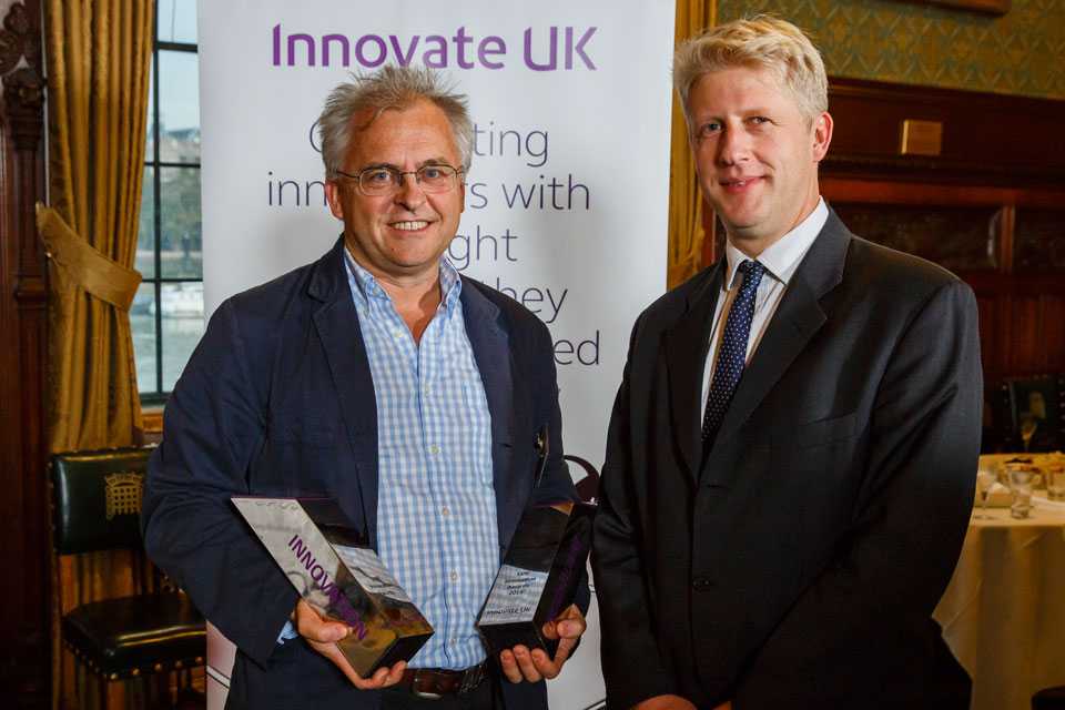 Jo Johnson MP, Minister of State for Universities, Science, Research and Innovation, presenting the inspirational innovation award to Dearman CEO Toby Peters at the SME innovation awards 2016.