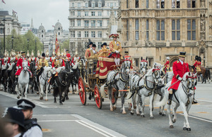 The Queen's carriage followed by members of the Household Cavalry Mounted Regiment arrives at the Houses of Parliament [Picture: Sergeant Adrian Harlen, Crown copyright]