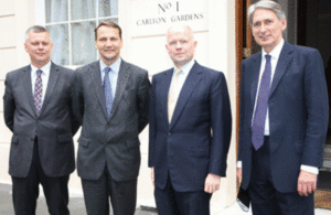 Foreign Secretary William Hague and Secretary of State for Defence Philip Hammond with Polish Foreign Minister Radek Sikorski and Polish Defence Minister Tomasz Siemoniak