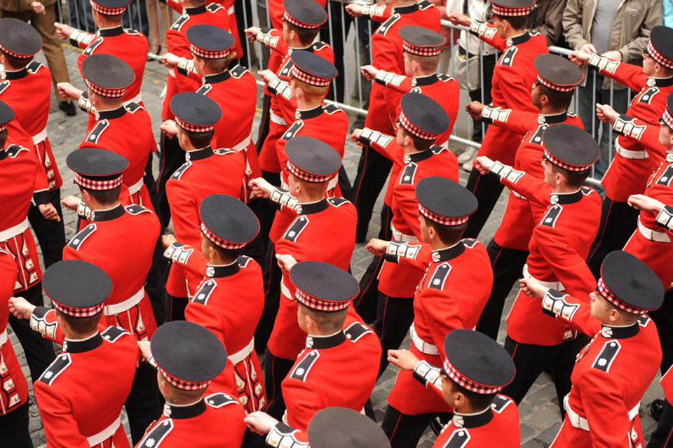 Members of the Scots Guards march down the Royal Mile in Edinburgh during Armed Forces Day 2011  