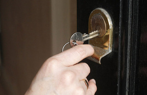 Key opening a front door