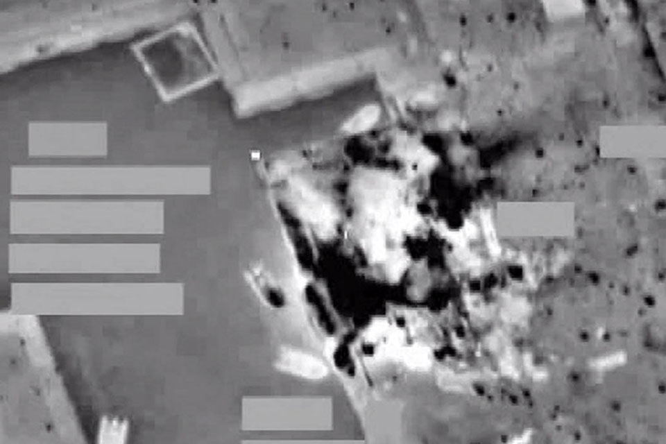 Targeting pod footage of an RAF missile strike on a Gaddafi-regime naval facility at Al Khums in northern Libya 