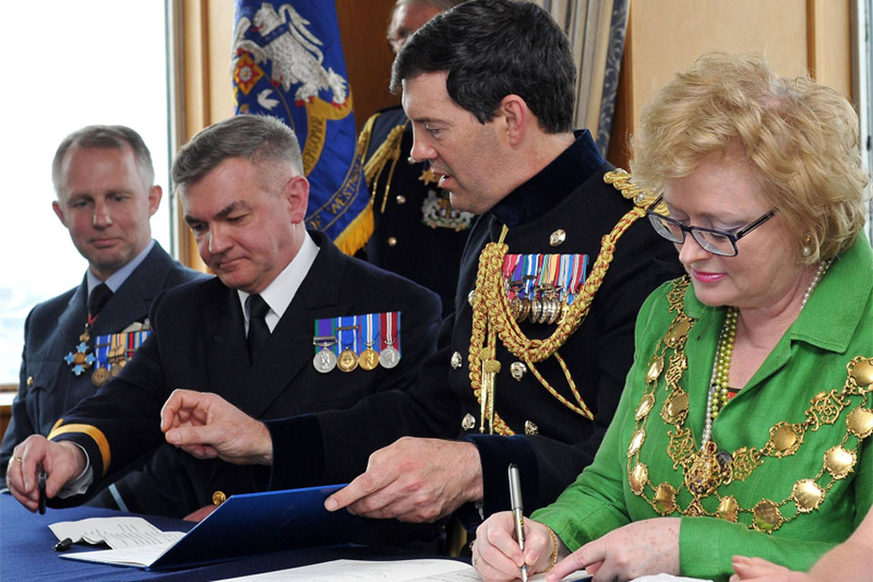 The Lord Mayor of Westminster, Councillor Angela Harvey, signs the Armed Forces Community Covenant for Westminster City Council 