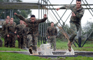 US Marines tackle the Bottom Field assault course at Commando Training Centre Royal Marines Lympstone [Picture: Sergeant Russ Nolan, Crown copyright]