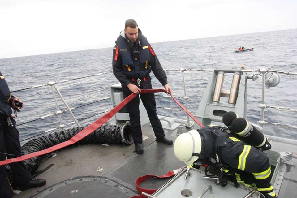 Firefighting exercise on HMS Blyth