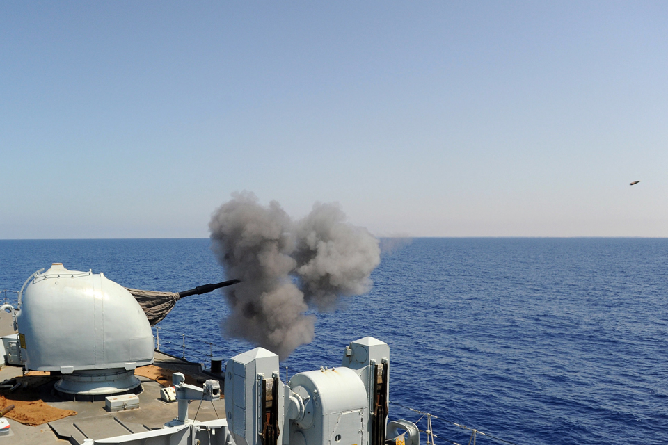 HMS Liverpool fires her 4.5-inch gun