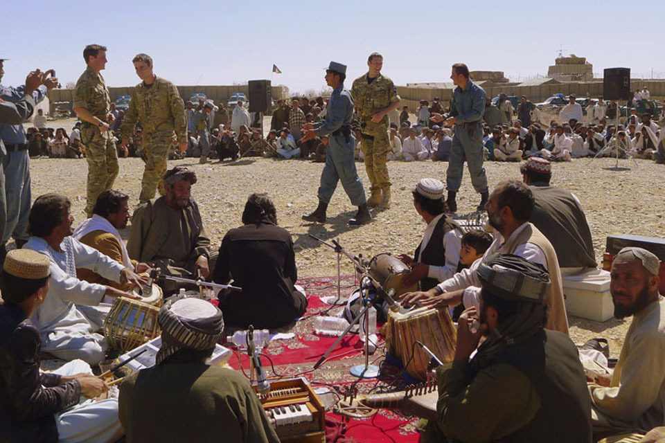 UK forces help Afghan police hold community party