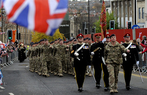 Members of the Light Dragoons march through Barnsley