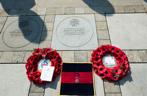 The commemorative paving stone is unveiled
