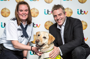 Border Force top dog Tyke with handler Sam O'Connor and TV presenter Donal MacIntyre