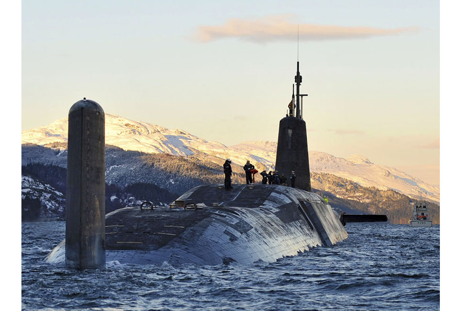 Nuclear submarine HMS Vanguard arriving back at HM Naval Base Clyde (stock image)  