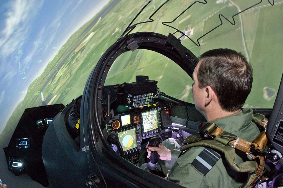 A pilot demonstrates a Hawk fast jet simulator