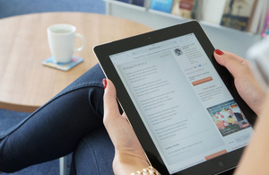 Women reading poetry on tablet