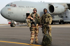 Senior Aircraftman William Wambiru (right) stands guard with a member of the French Air Force at Bamako Airport in Mali [Picture: Wing Commander Dylan Eklund, Crown Copyright/MOD 2013]