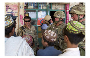 Mr Michael O'Neill, Head of Helmand Provincial Reconstruction Team, is given a tour of Naqilabad and Showal in northern Nad 'Ali by Royal Marines of 42 Commando