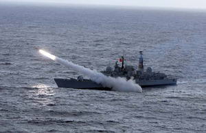 A Sea Dart missile races away from HMS EDINBURGH off the coast of the Outer Hebrides