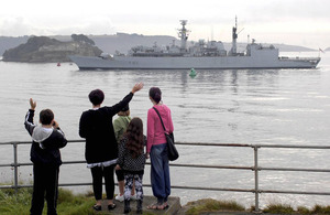HMS Cumberland passes Drake's Island in Plymouth Sound as she leaves for the Middle East