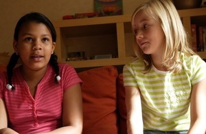 Two girls on a sofa