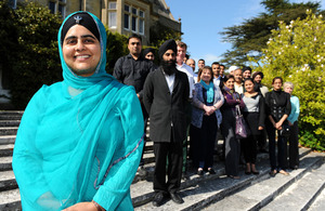 Mandeep Kaur and assembled delegates on the steps of Amport House