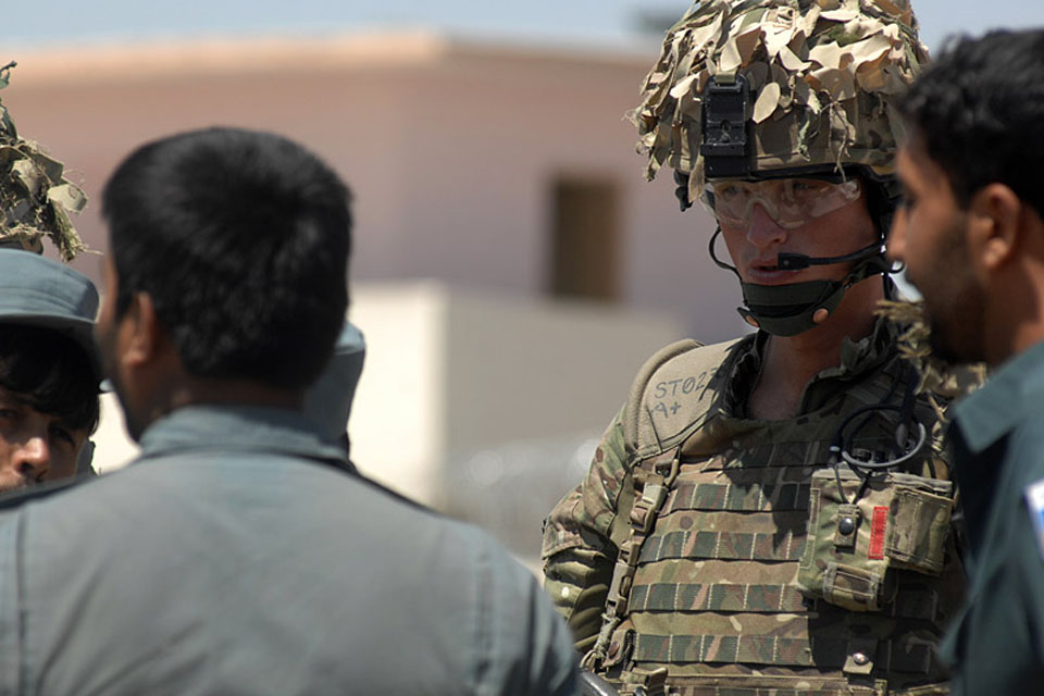 Lance Corporal Aiden Cooper, 253 Provost Company of the Royal Military Police, working with Afghan Uniform Police in Lashkar Gah as a police advisor