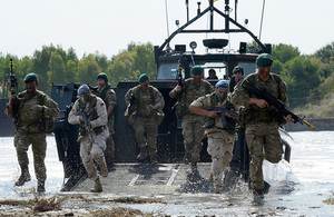 Various elements of 3 Commando Brigade Royal Marines as they conduct a Commando amphibious raid demonstration. Crown Copyright.